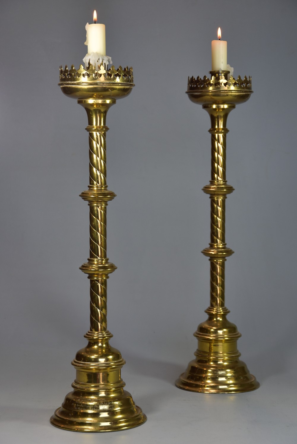 Pair of highly decorative late 19th century Gothic style brass candlesticks