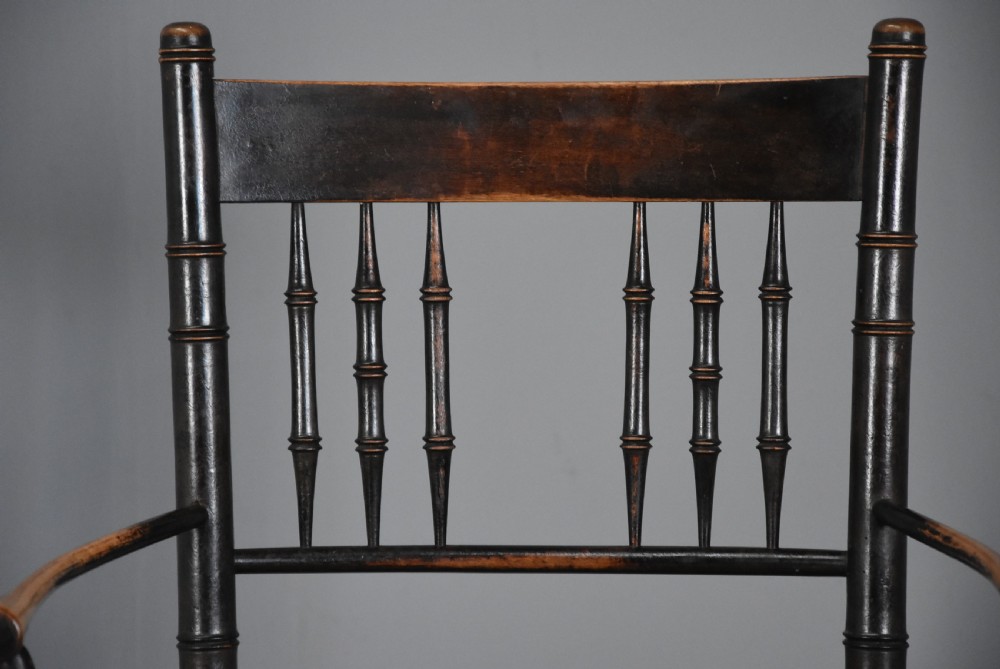 Late 19th century ebonised Sussex armchair attributed to Morris & Co. View IV