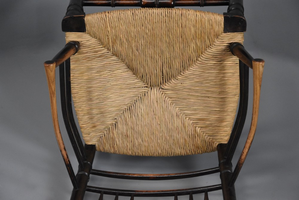 Late 19th century ebonised Sussex armchair attributed to Morris & Co. View XI
