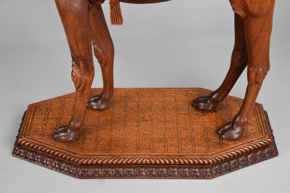 Late 19th century Anglo Indian hardwood camel table of superb quality, possibly from the Gujarat region of India View XII