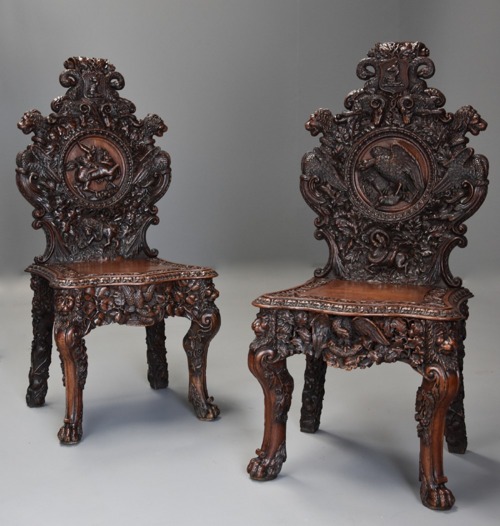 Superb pair of mid 19thc Exhibition quality carved oak chairs of large proportion View II
