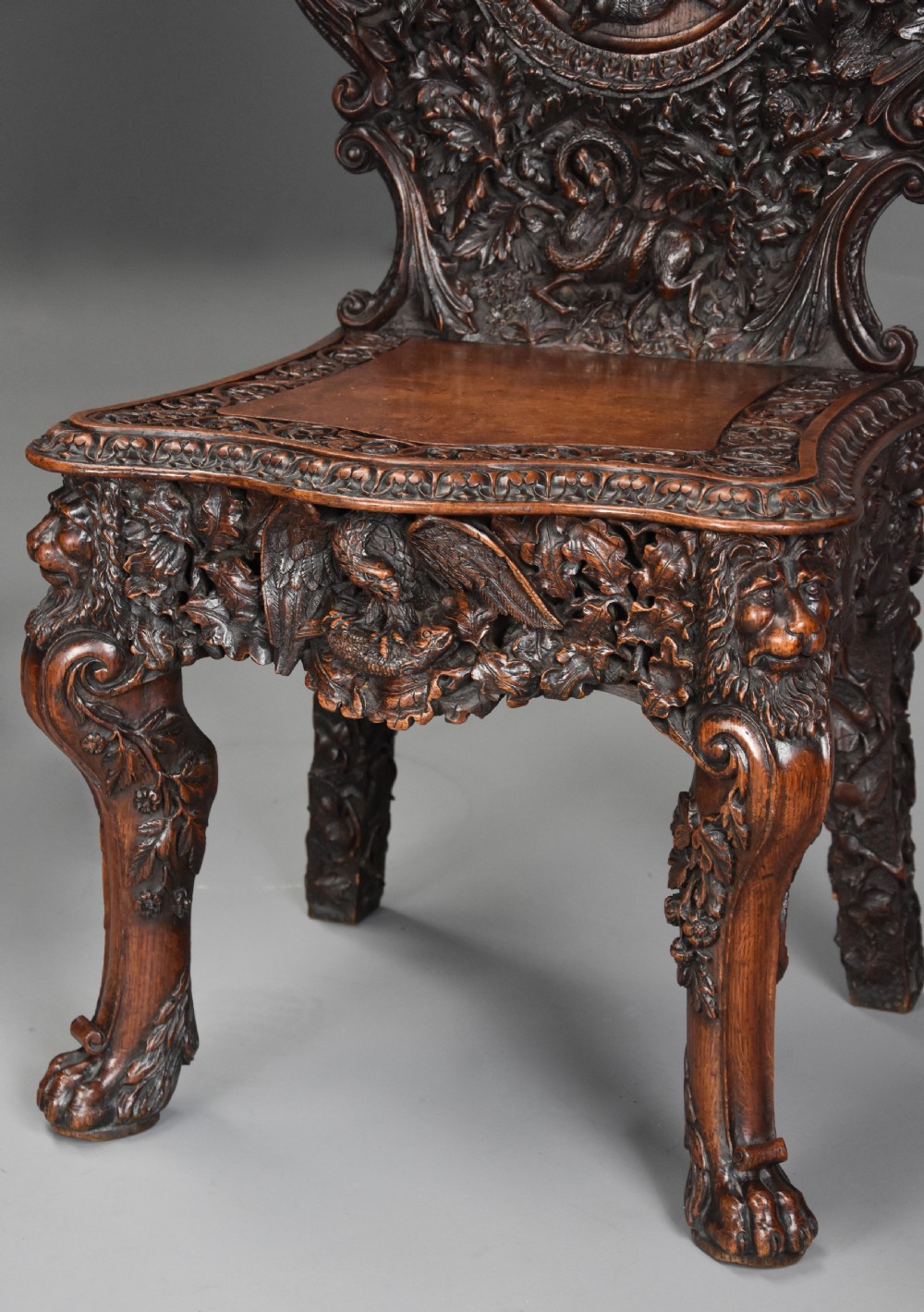 Superb pair of mid 19thc Exhibition quality carved oak chairs of large proportion View XI