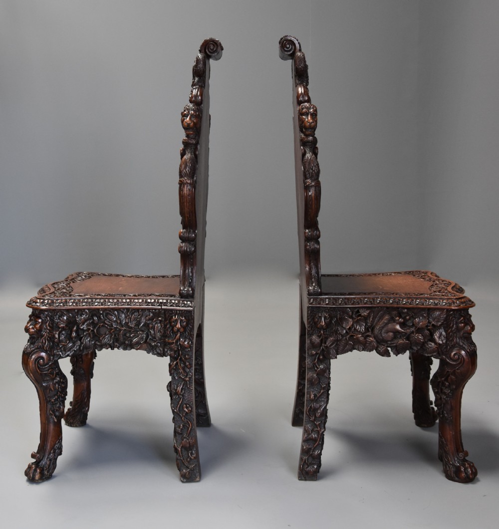 Superb pair of mid 19thc Exhibition quality carved oak chairs of large proportion View XV