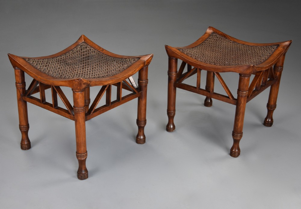 Pair of early 20th century walnut Thebes stools, designed by Liberty & Co. View IV