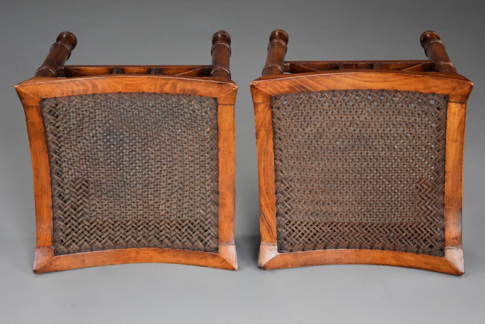 Pair of early 20th century walnut Thebes stools, designed by Liberty & Co. View VIII
