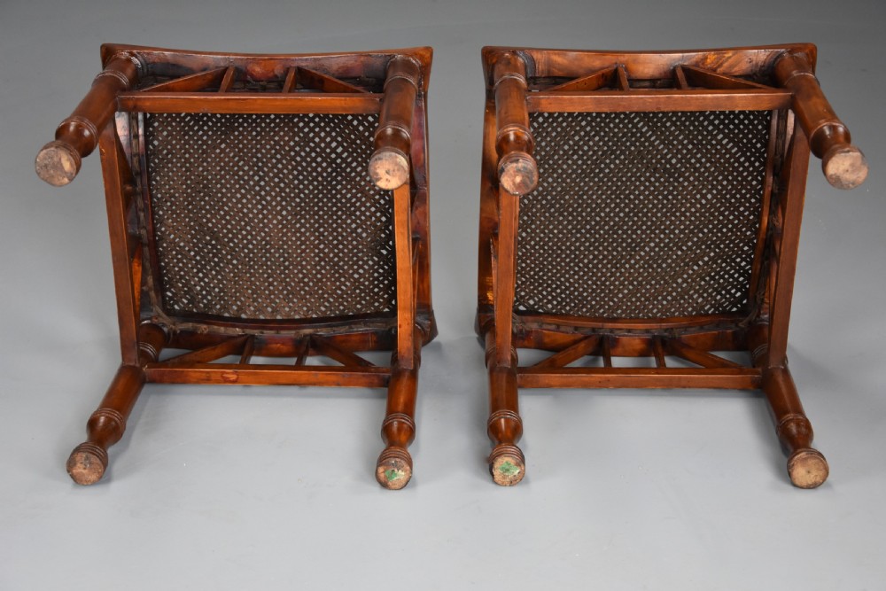 Pair of early 20th century walnut Thebes stools, designed by Liberty & Co. View IX