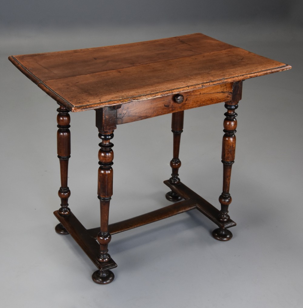 Late 17th century Continental walnut side table with drawer of superb patina 
