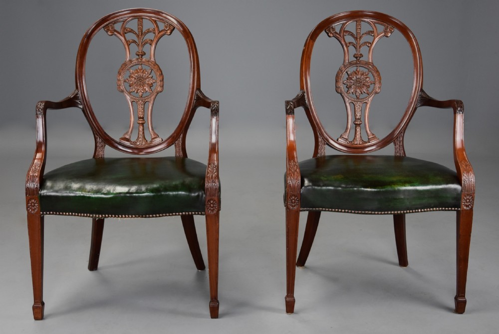 Pair of late 19th century Hepplewhite style mahogany oval back open armchairs View II