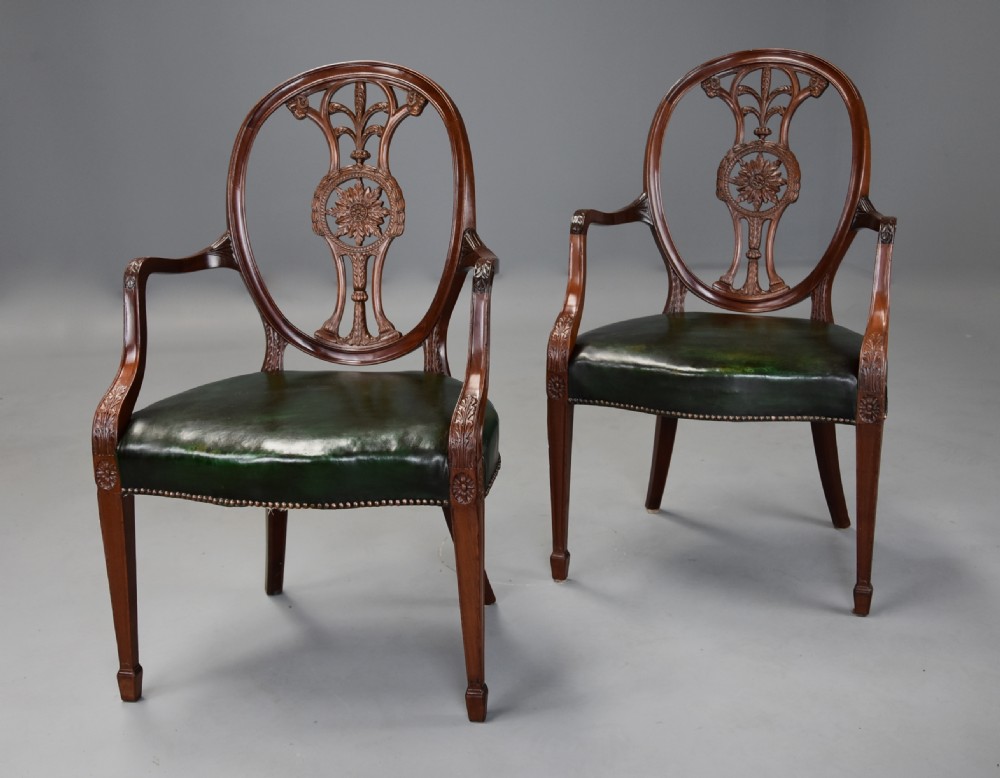Pair of late 19th century Hepplewhite style mahogany oval back open armchairs View III