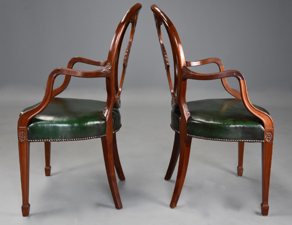 Pair of late 19th century Hepplewhite style mahogany oval back open armchairs View XI