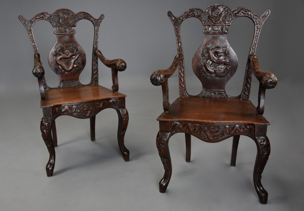 Pair of highly decorative 19thc walnut open armchairs of Chinese influence in the 18thc style