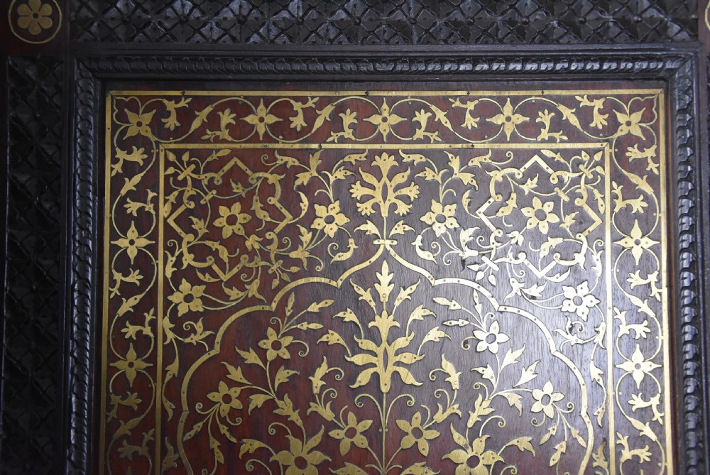 Fine quality 19thc Anglo Indian profusely carved padouk & brass inlaid four fold screen from Northern India View VIII