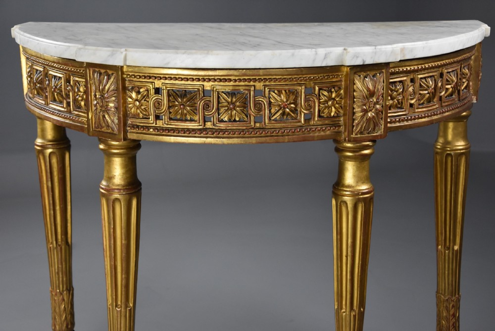 Highly decorative late 19th century French demi-lune gilt console table View V