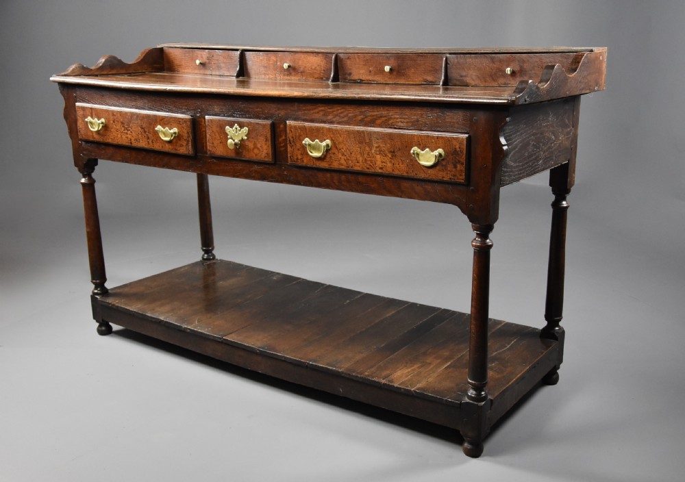 Mid 18th century oak potboard dresser base of superb patina View VI