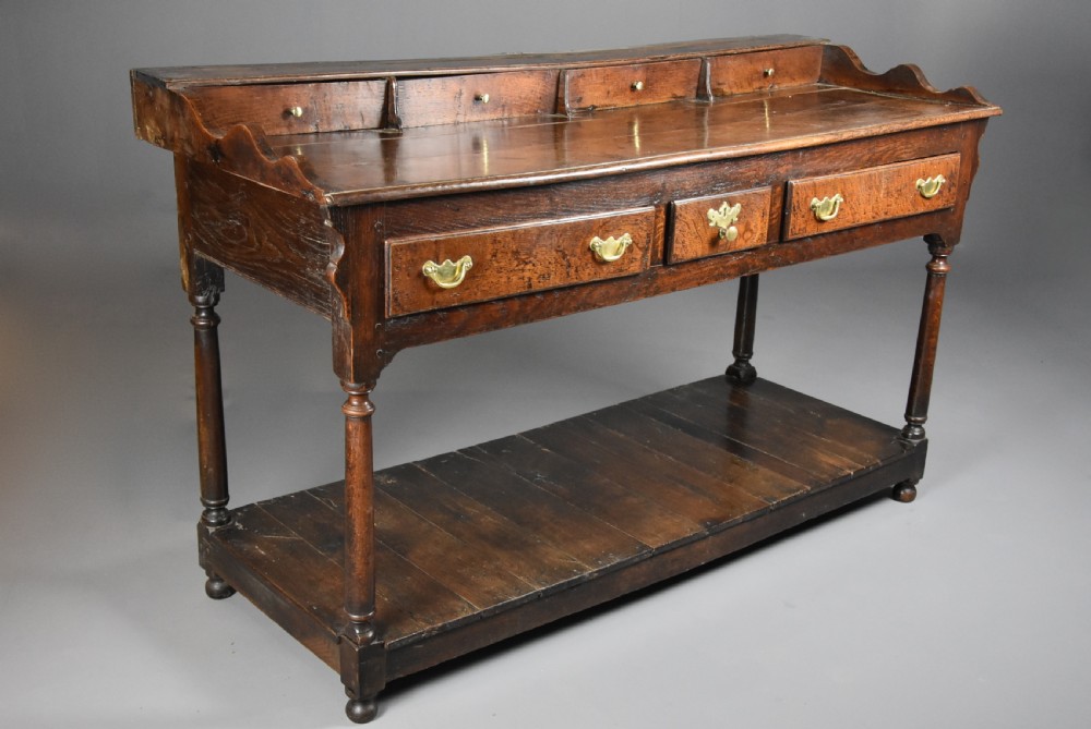 Mid 18th century oak potboard dresser base of superb patina View VII