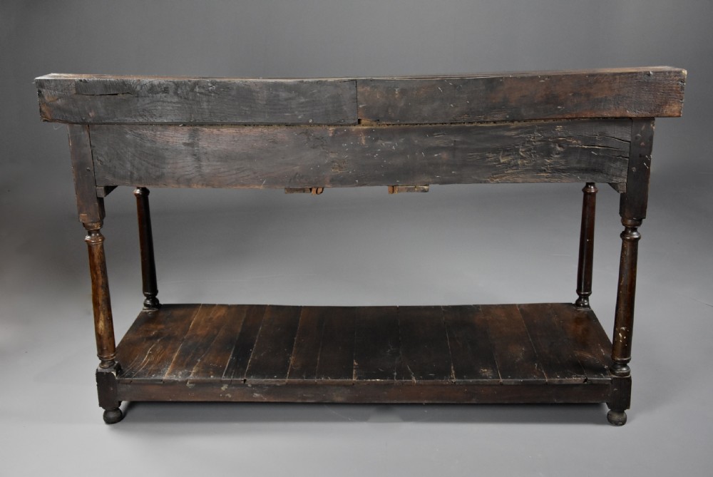 Mid 18th century oak potboard dresser base of superb patina View XII