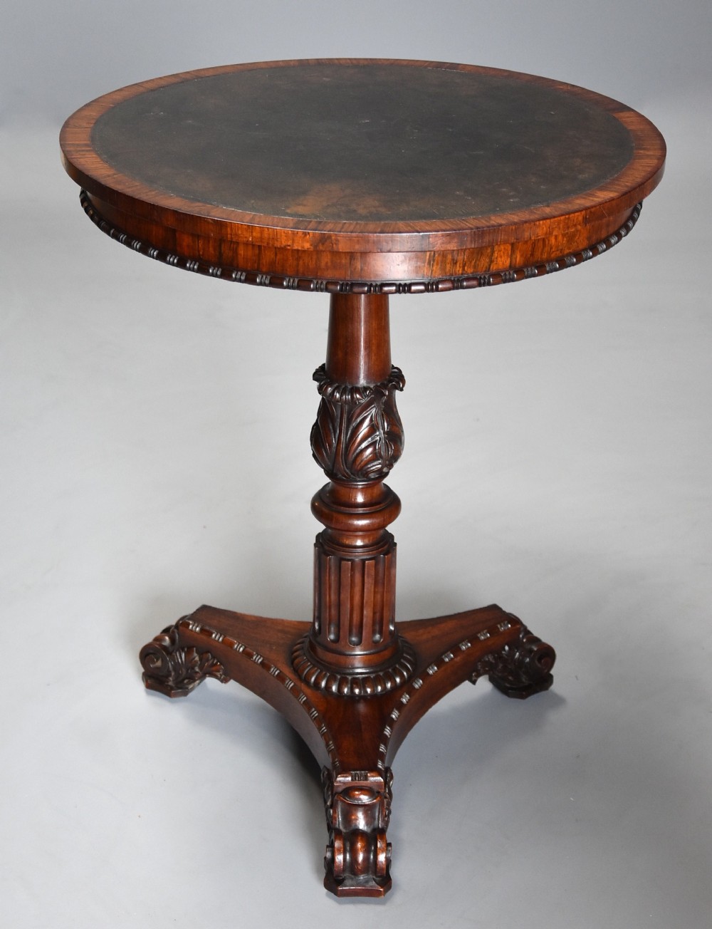Exceptionally fine quality 19thc rosewood circular occasional table with leather top
