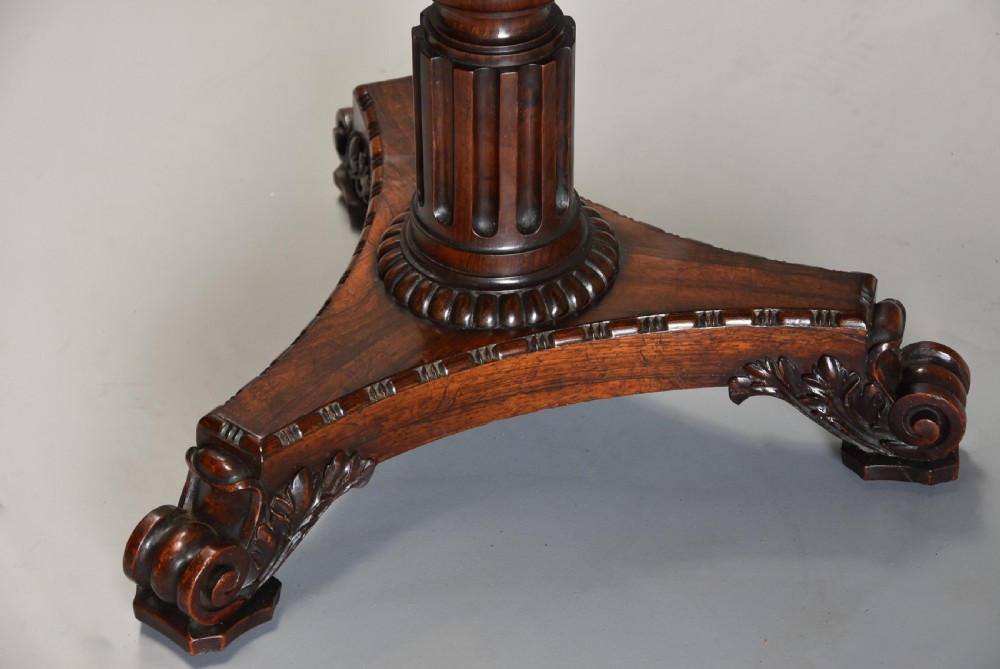 Exceptionally fine quality 19thc rosewood circular occasional table with leather top View VI