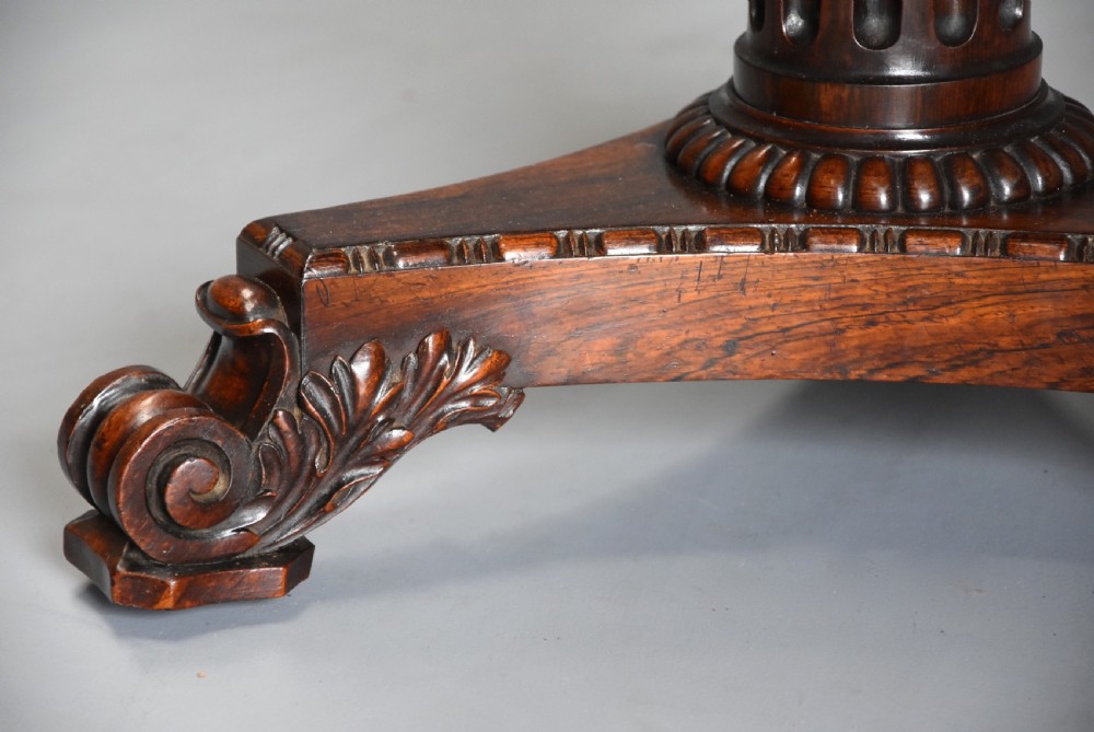 Exceptionally fine quality 19thc rosewood circular occasional table with leather top View VII