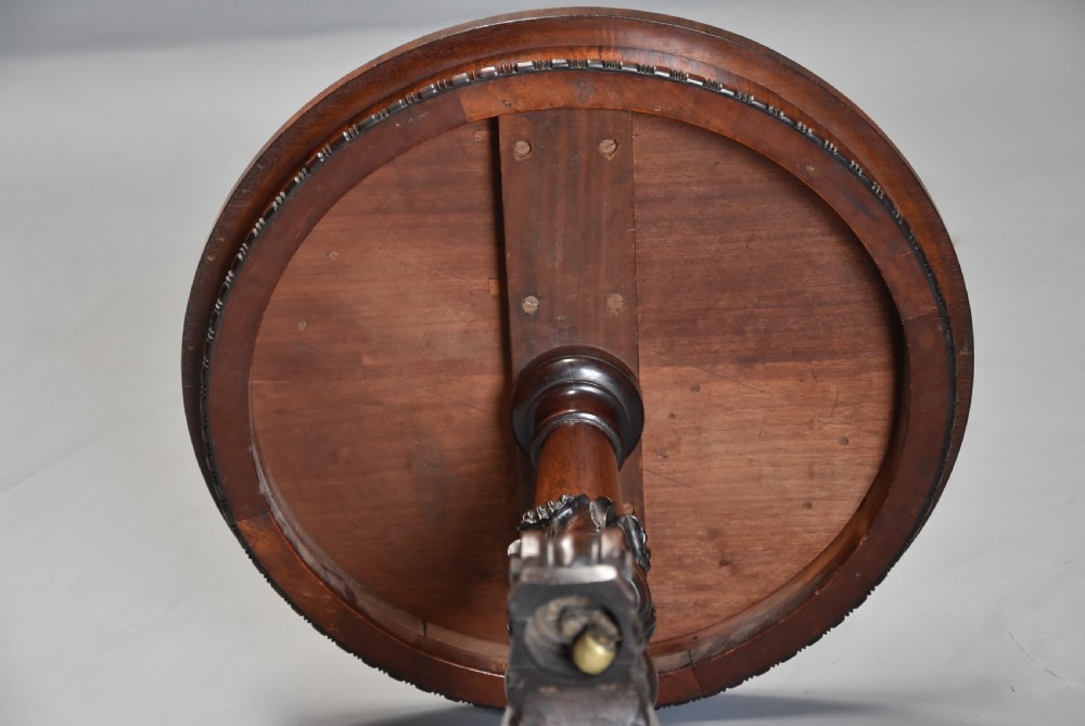 Exceptionally fine quality 19thc rosewood circular occasional table with leather top View X