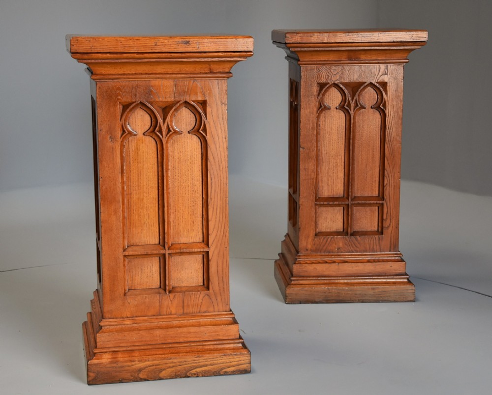Pair of late 19th century ash pedestals in the Gothic style of good patina 