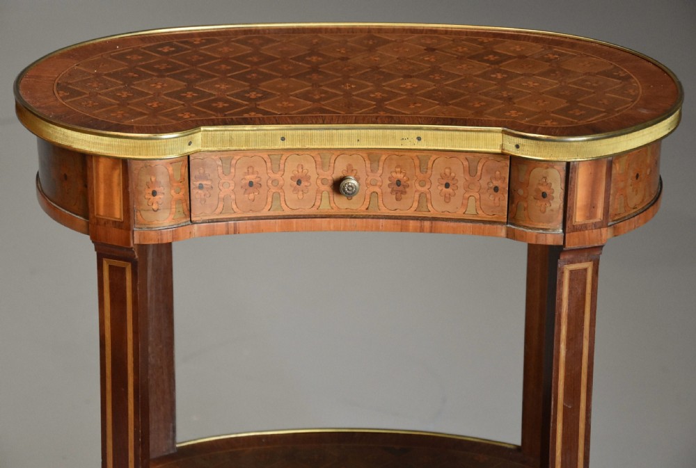 Fine quality late 19thc French parquetry two tier Kingwood kidney shaped table View V