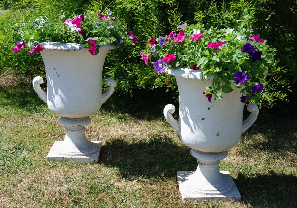 Large pair of 19th century highly decorative cast iron campana shaped urns