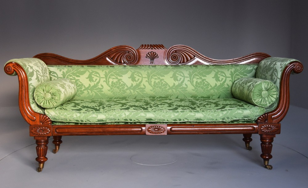 19th century late Regency scroll end mahogany sofa upholstered in green silk fabric View III