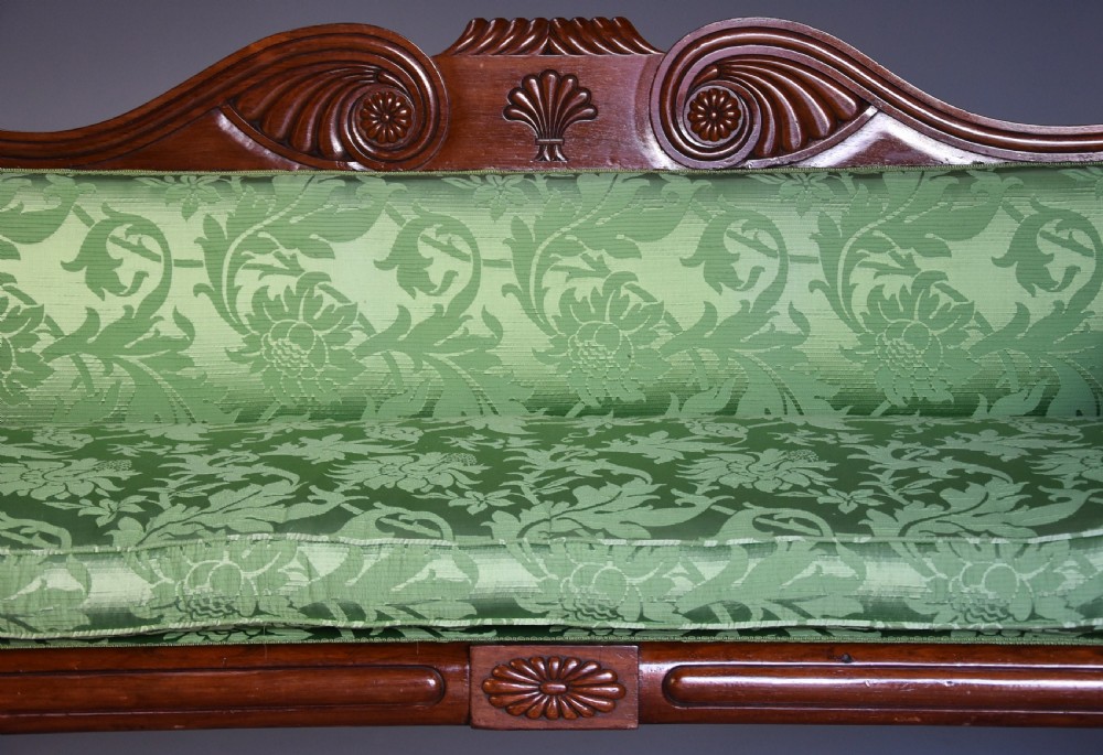 19th century late Regency scroll end mahogany sofa upholstered in green silk fabric View VI