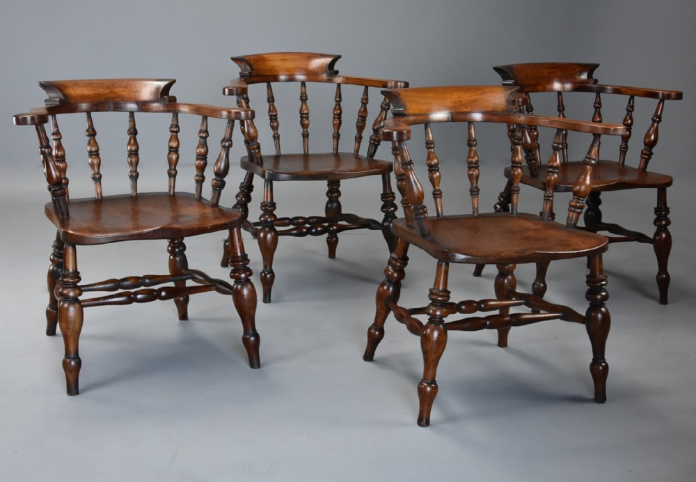 Set of four mid 19th century beech & elm smokers bow Windsor or Captains chairs