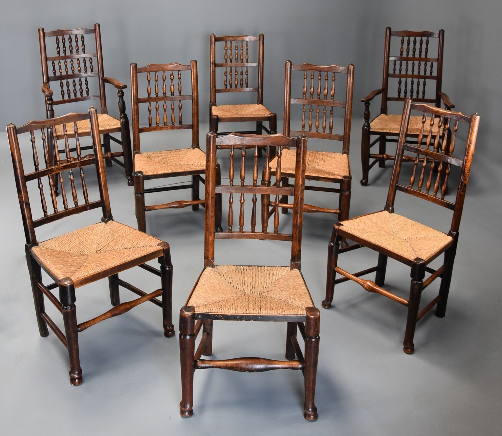 Matched set of eight mid 19th century ash spindle back chairs of superb patina