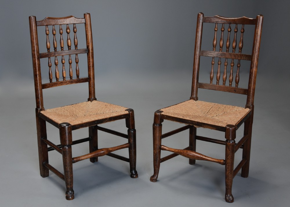 Matched set of eight mid 19th century ash spindle back chairs of superb patina View VI