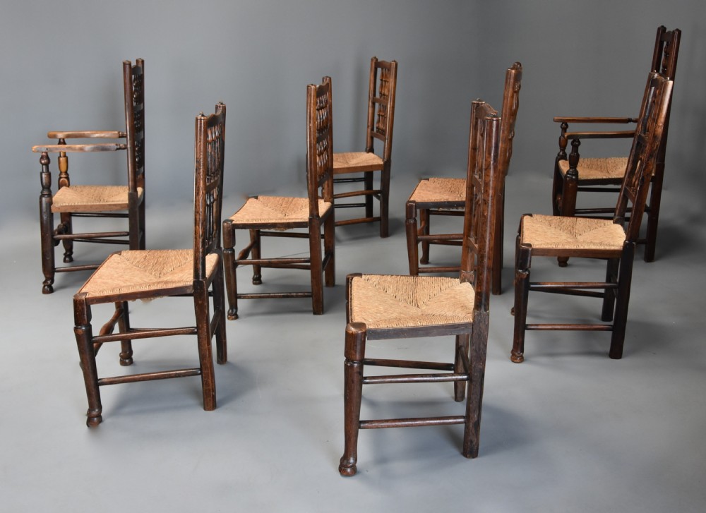 Matched set of eight mid 19th century ash spindle back chairs of superb patina View X