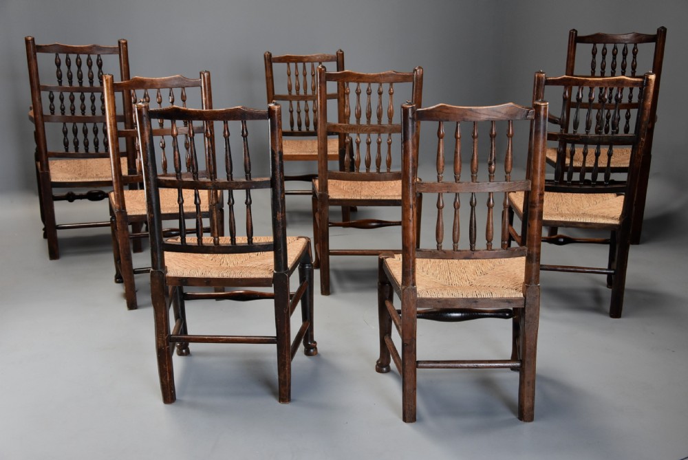 Matched set of eight mid 19th century ash spindle back chairs of superb patina View XII