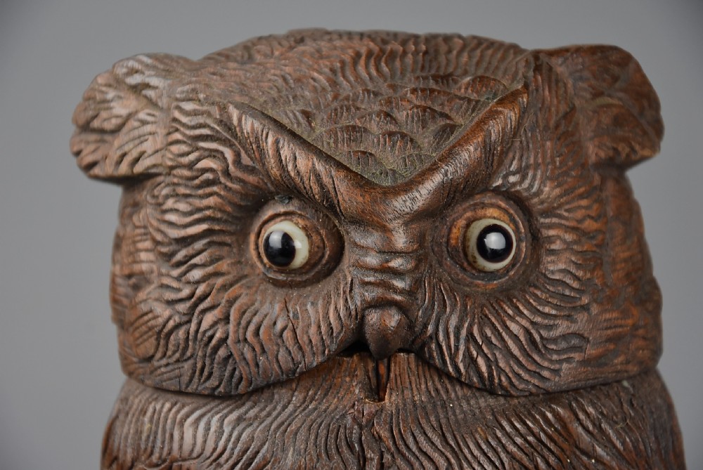Finely carved 19thc Black Forest linden wood storage jar in the form of an owl View V