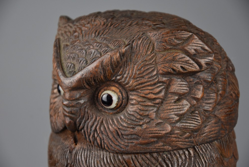 Finely carved 19thc Black Forest linden wood storage jar in the form of an owl View VIII