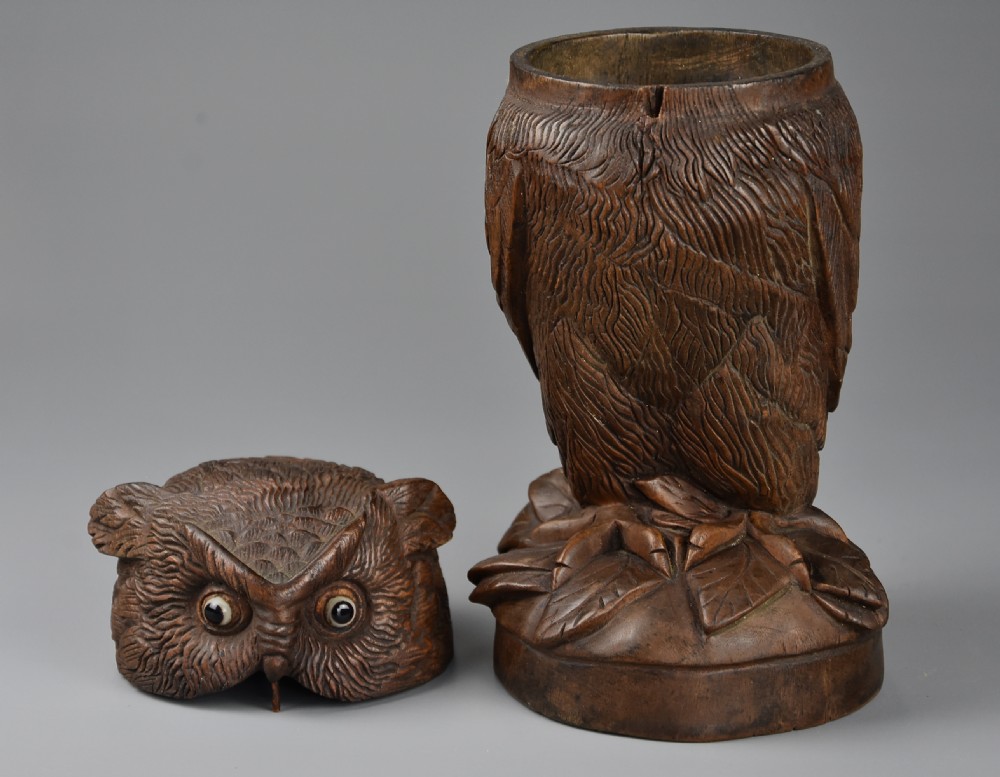 Finely carved 19thc Black Forest linden wood storage jar in the form of an owl View XII