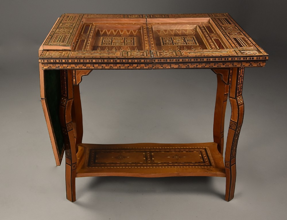 Highly decorative early 20th century Middle Eastern Damascus inlaid games table  View X