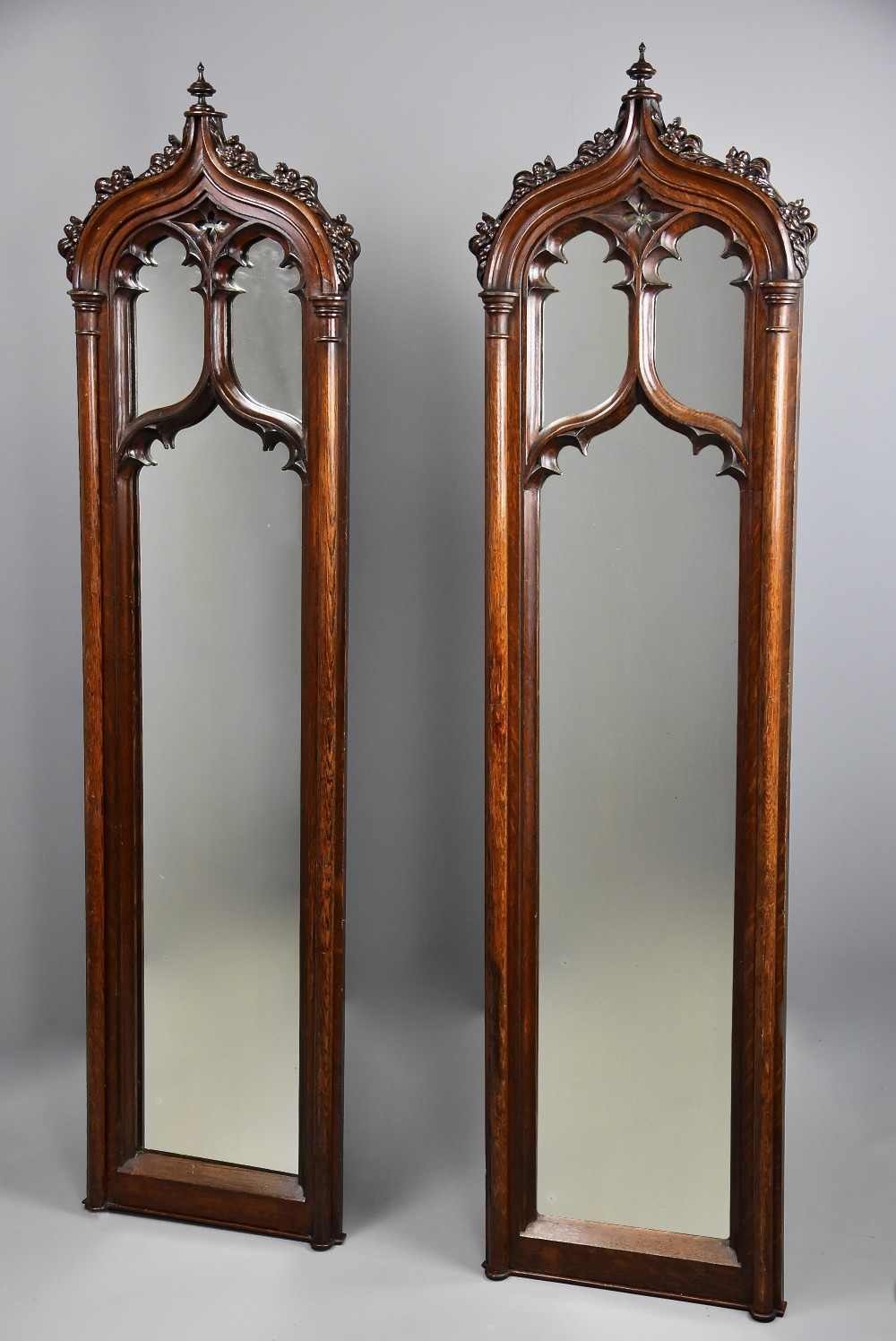 Fine pair of mid 19th century oak Gothic mirrors 