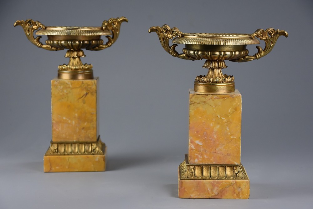 Pair of French highly decorative early 20thc gilt metal tazzas on marble bases in the Neoclassical style View II