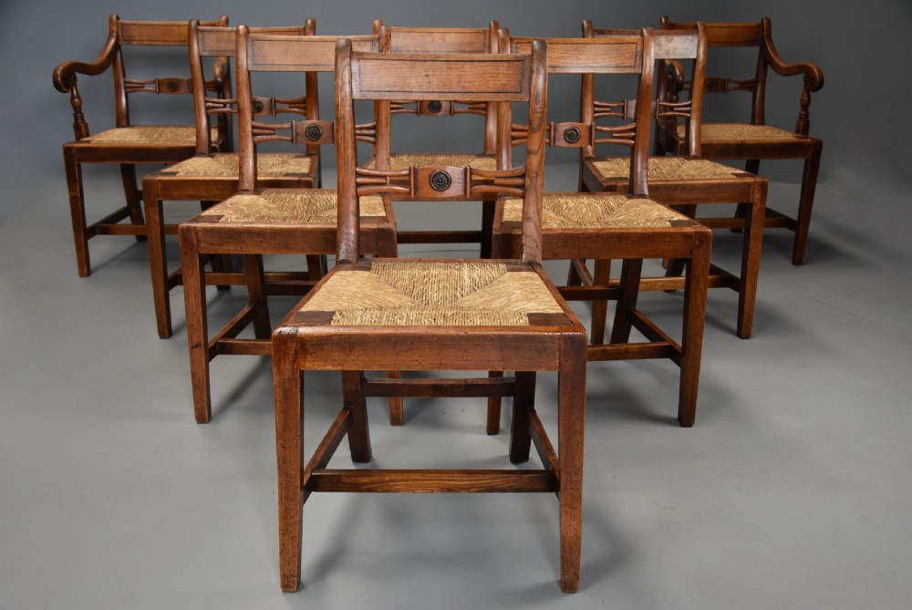 Charming set of eight early 19thc elm country chairs of good patina, probably East Anglian 
