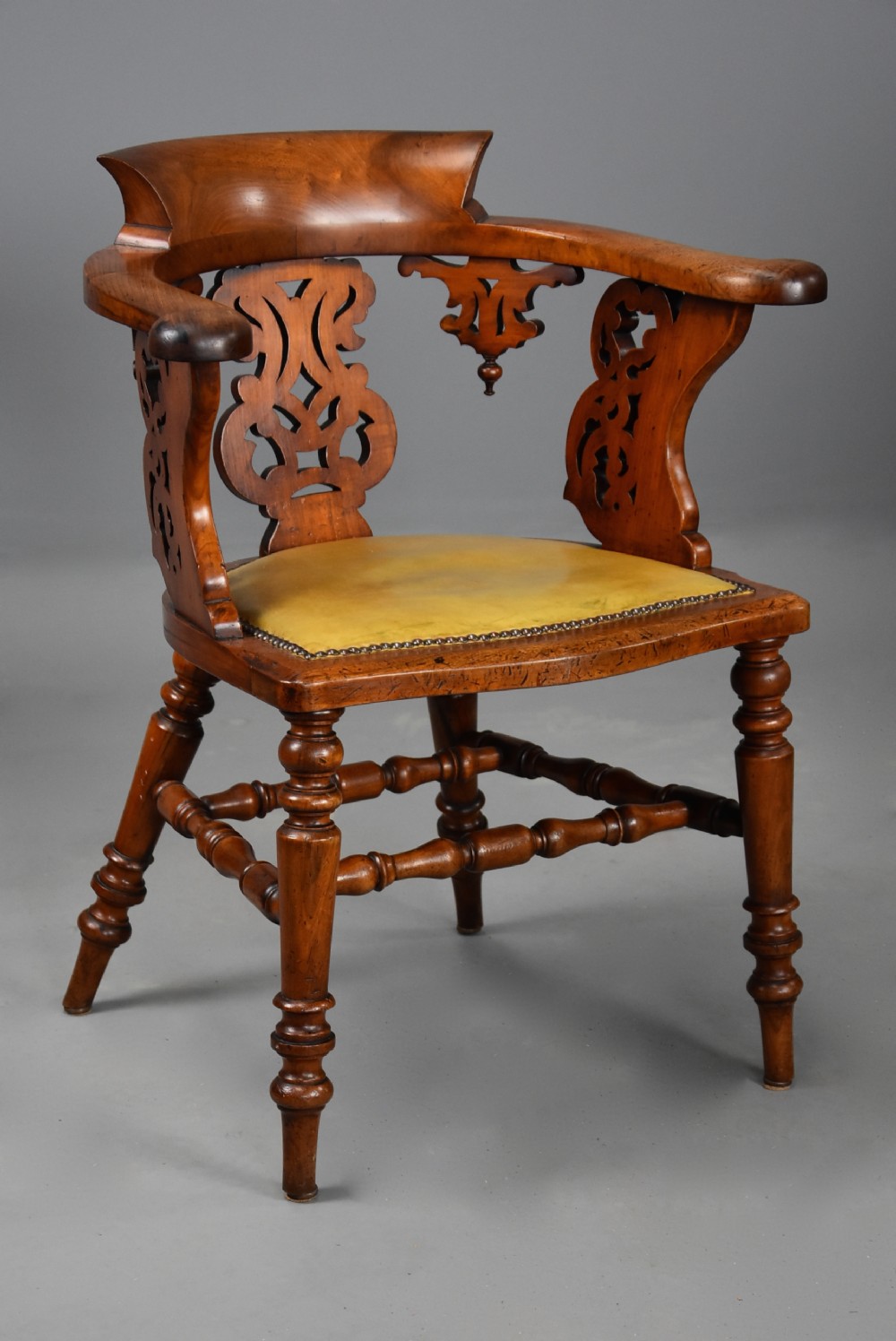 Mid 19th century walnut office armchair of fine patina