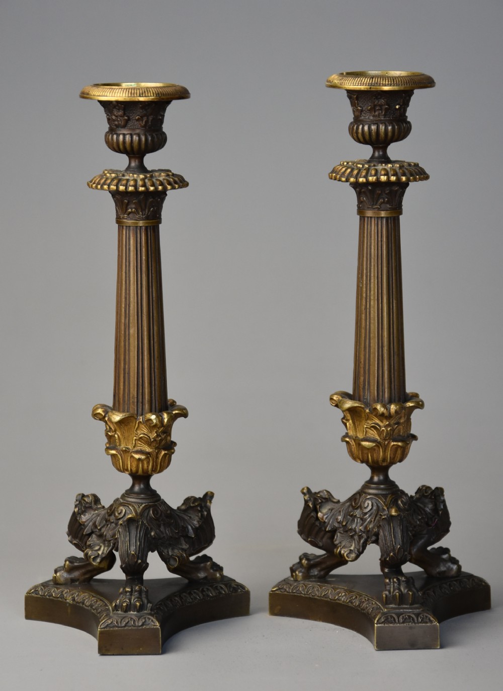 Fine quality pair of early 19thc Regency bronze and gilt bronze candlesticks