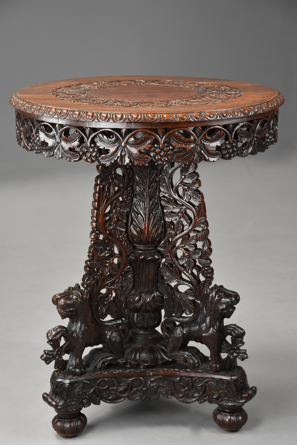 Mid 19th century Anglo Indian carved padouk centre table of fine patina