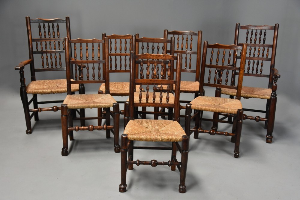 Matched set of eight mid 19thc ash, elm and sycamore spindle back chairs of super patina View II