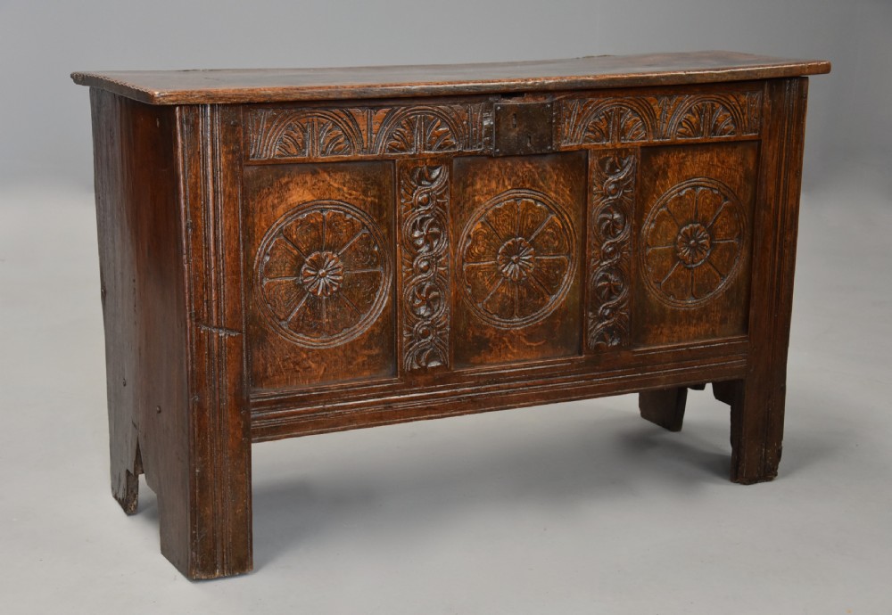 Mid 17th century joined and carved oak coffer of good proportions and fine original patina View II