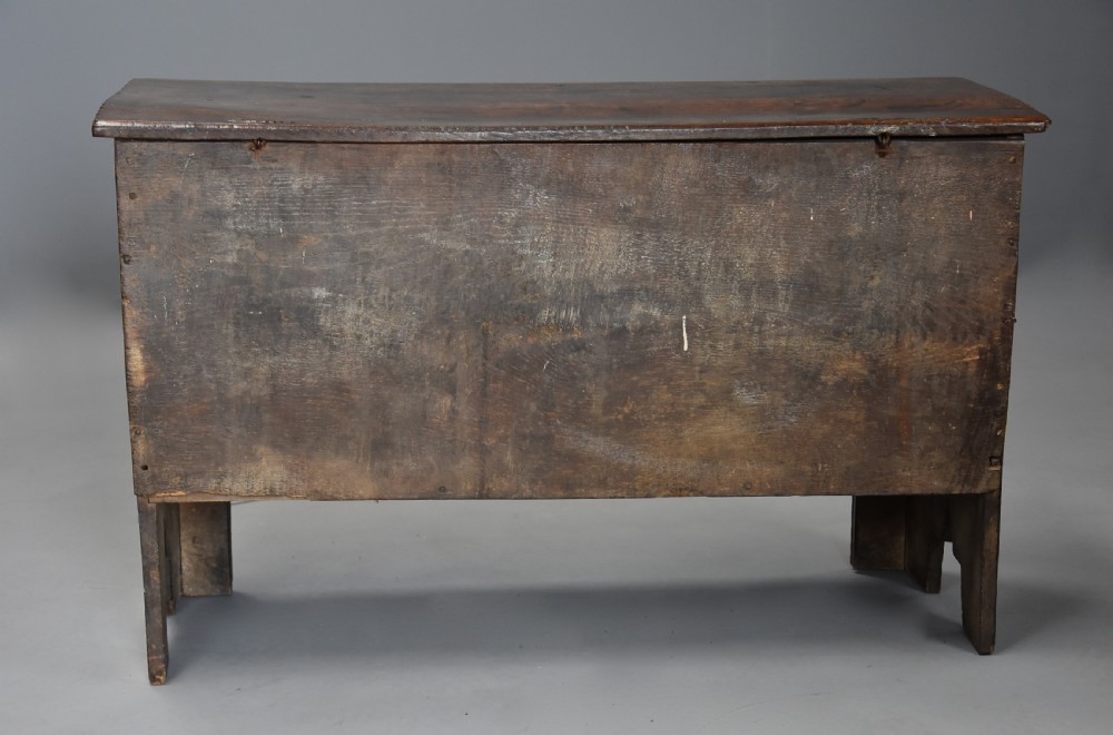 Mid 17th century joined and carved oak coffer of good proportions and fine original patina View X