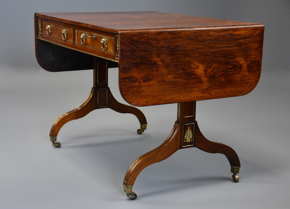 Fine quality English Regency rosewood and brass sofa table View IV