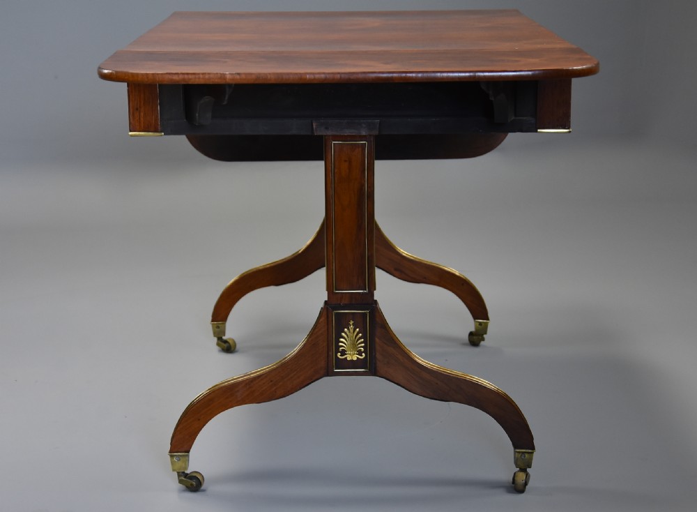 Fine quality English Regency rosewood and brass sofa table View IX