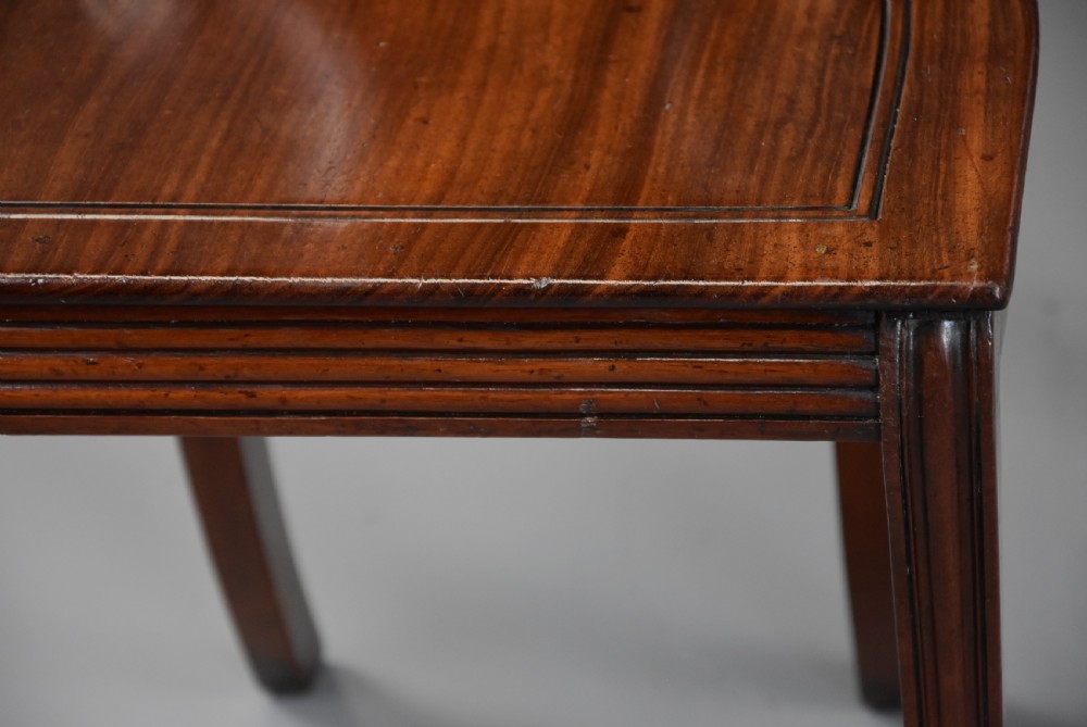 Pair of early 19th century Regency mahogany hall chairs of fine patina View X